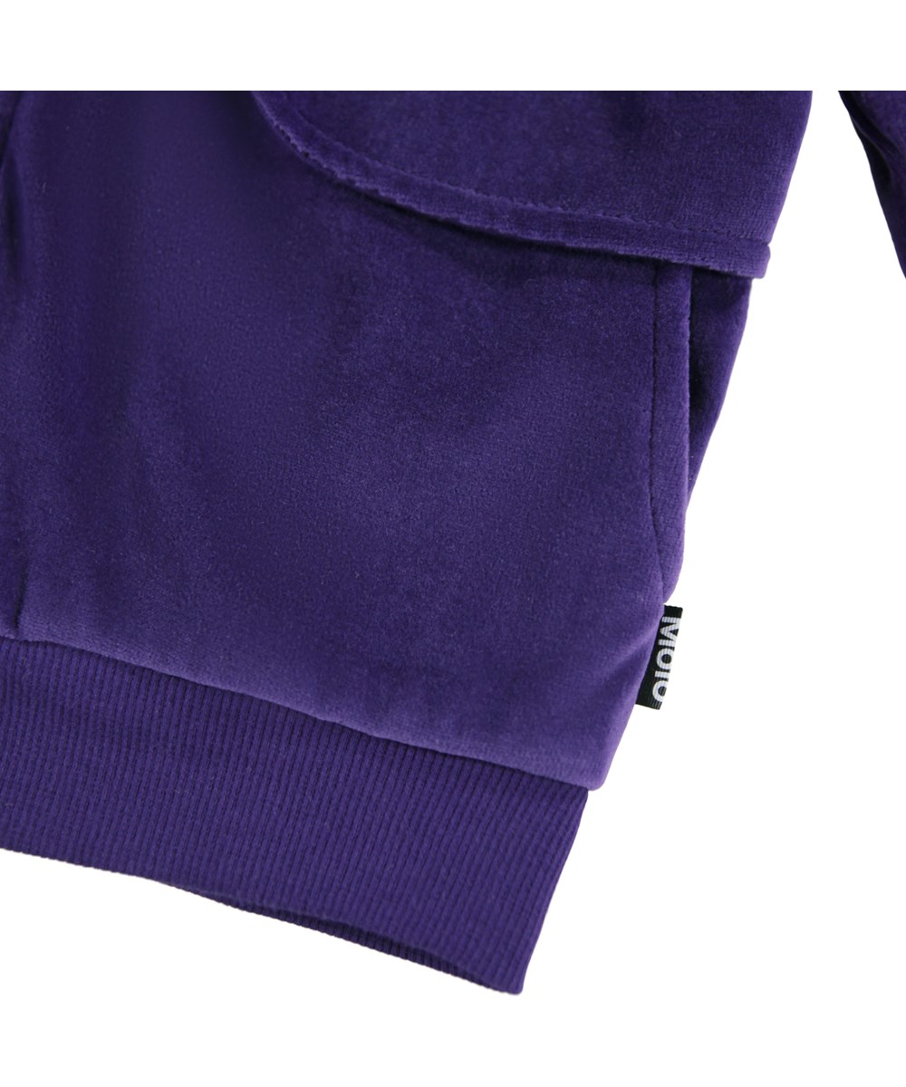 Malika - Space Purple - Purple cardigan made of soft velour.
