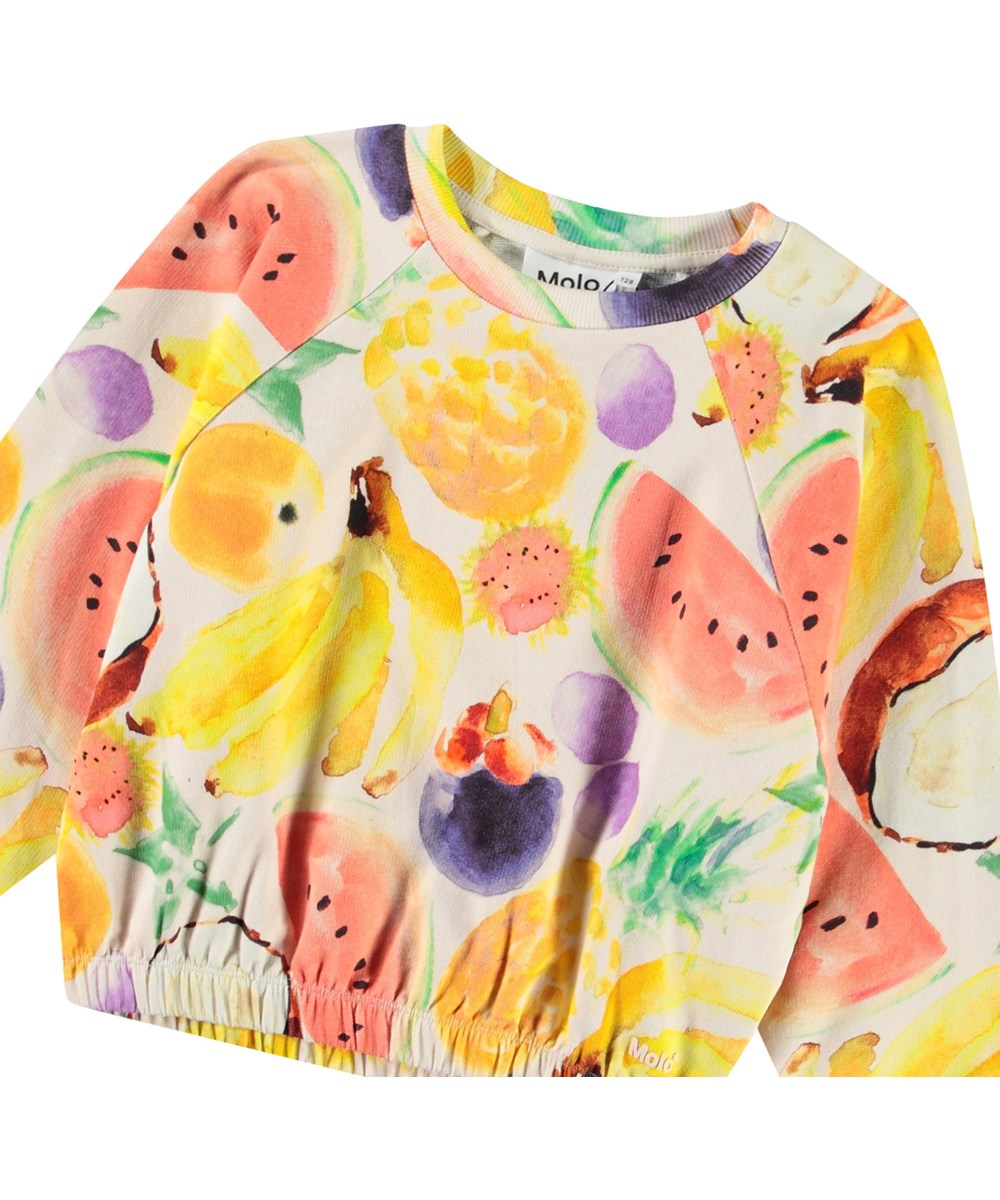 Malinda - Fruit Salad - Off-white sweatshirt with print for children in soft organic cotton with ribbed edges at the neck and sleeves.