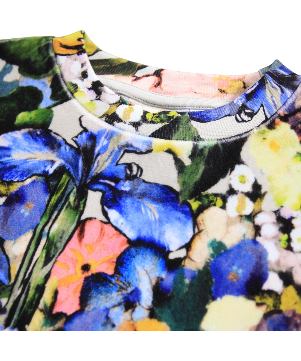 Marika - Floral Impression - Multicoloured sweatshirt for children made of soft cotton velour with a floral print.