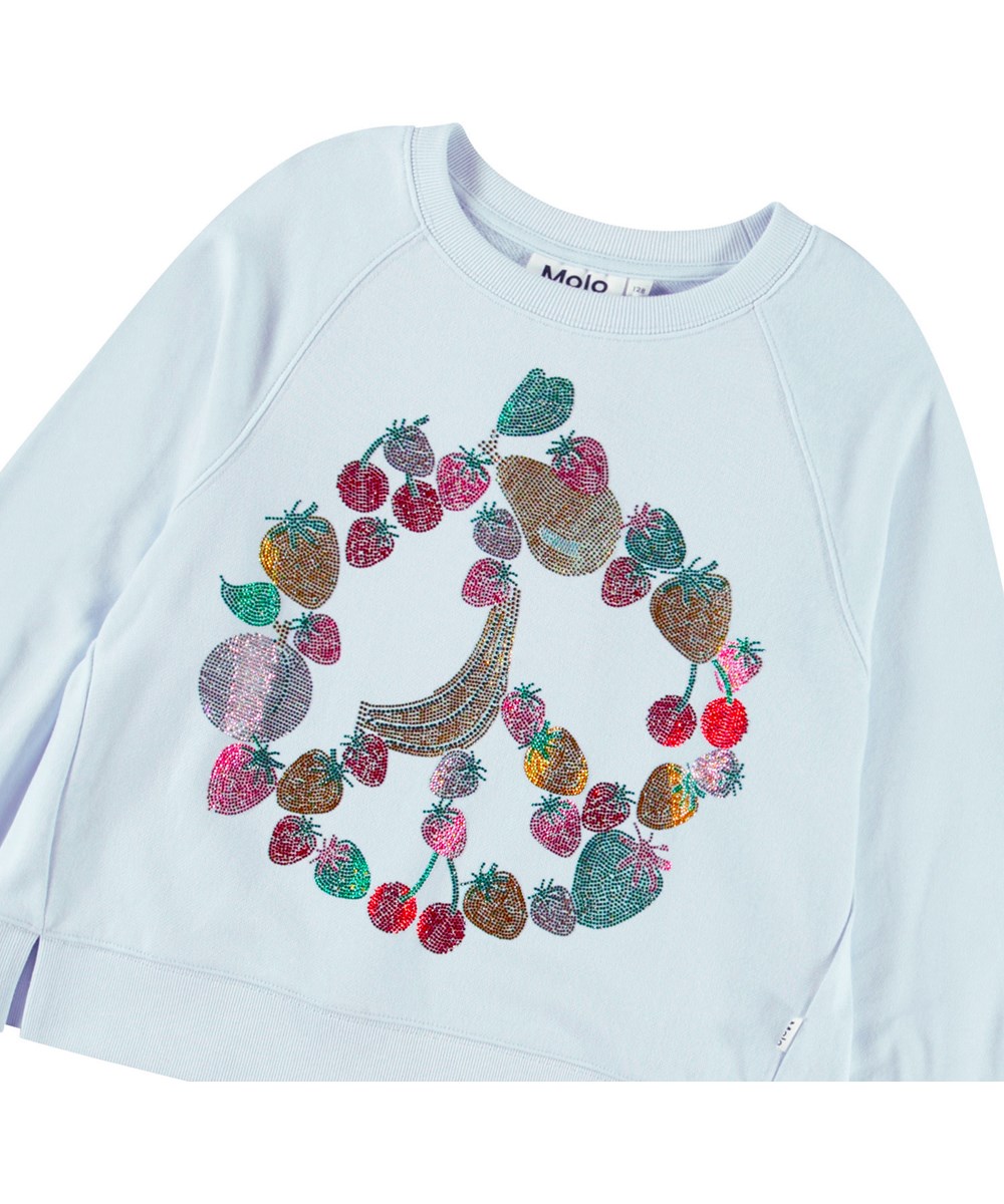 Marilee - Glitter Fruits - Light blue sweatshirt with slits for children in soft organic cotton with ribbed edges at the neck, sleeves, and bottom of the sweatshirt.