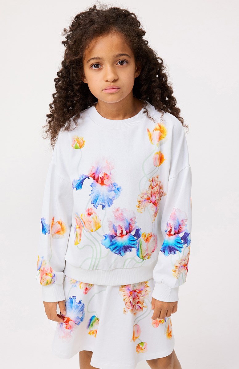 Maxi - Petals Galore - White sweatshirt with print for children in soft organic cotton with ribbed edges at the neck, sleeves, and bottom of the sweatshirt.