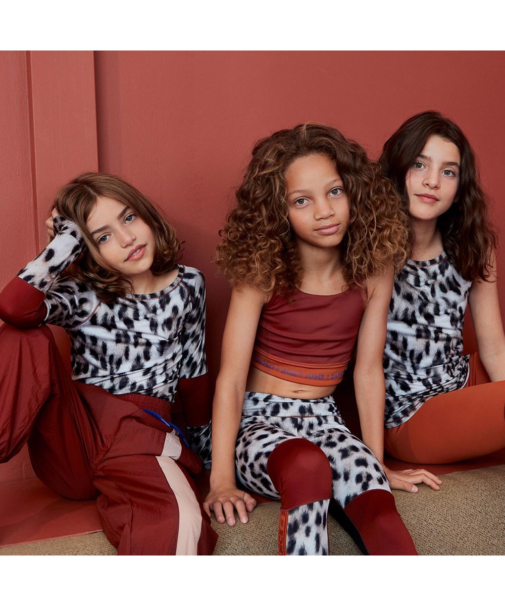 Odelia - Snowy Leo Fur - Sports top with snow leopard print