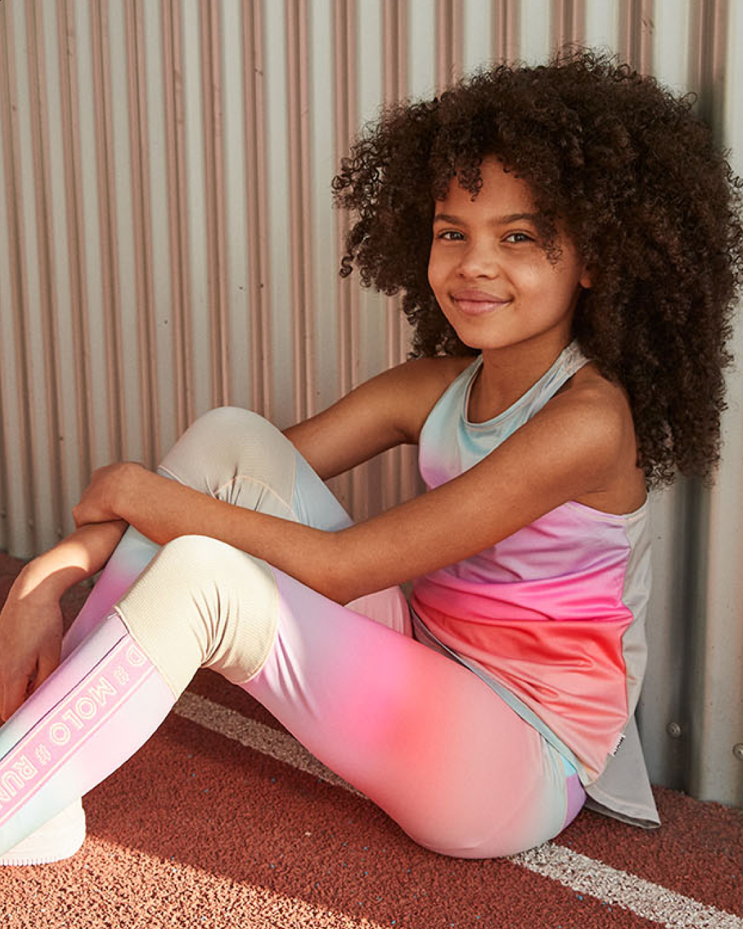 Oriana - Misty Stripe - Sports top with pastel rainbow print
