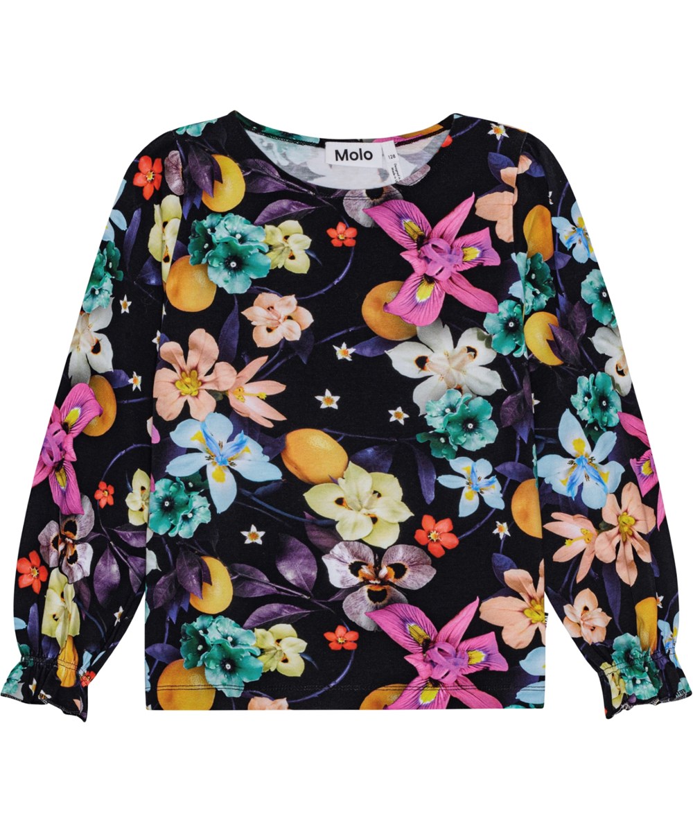 Raina - Garden Of Plenty - Black long-sleeved organic cotton top with colourful flower print. Round neckline.
