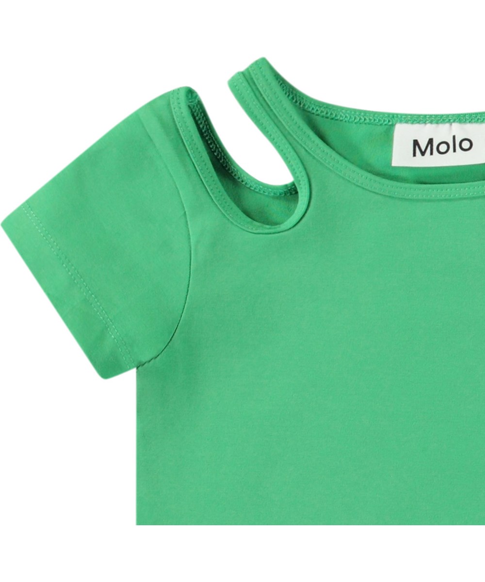 Raja - Jungle Power - Fitted green t-shirt in organic cotton with a round neck and open on the right shoulder.