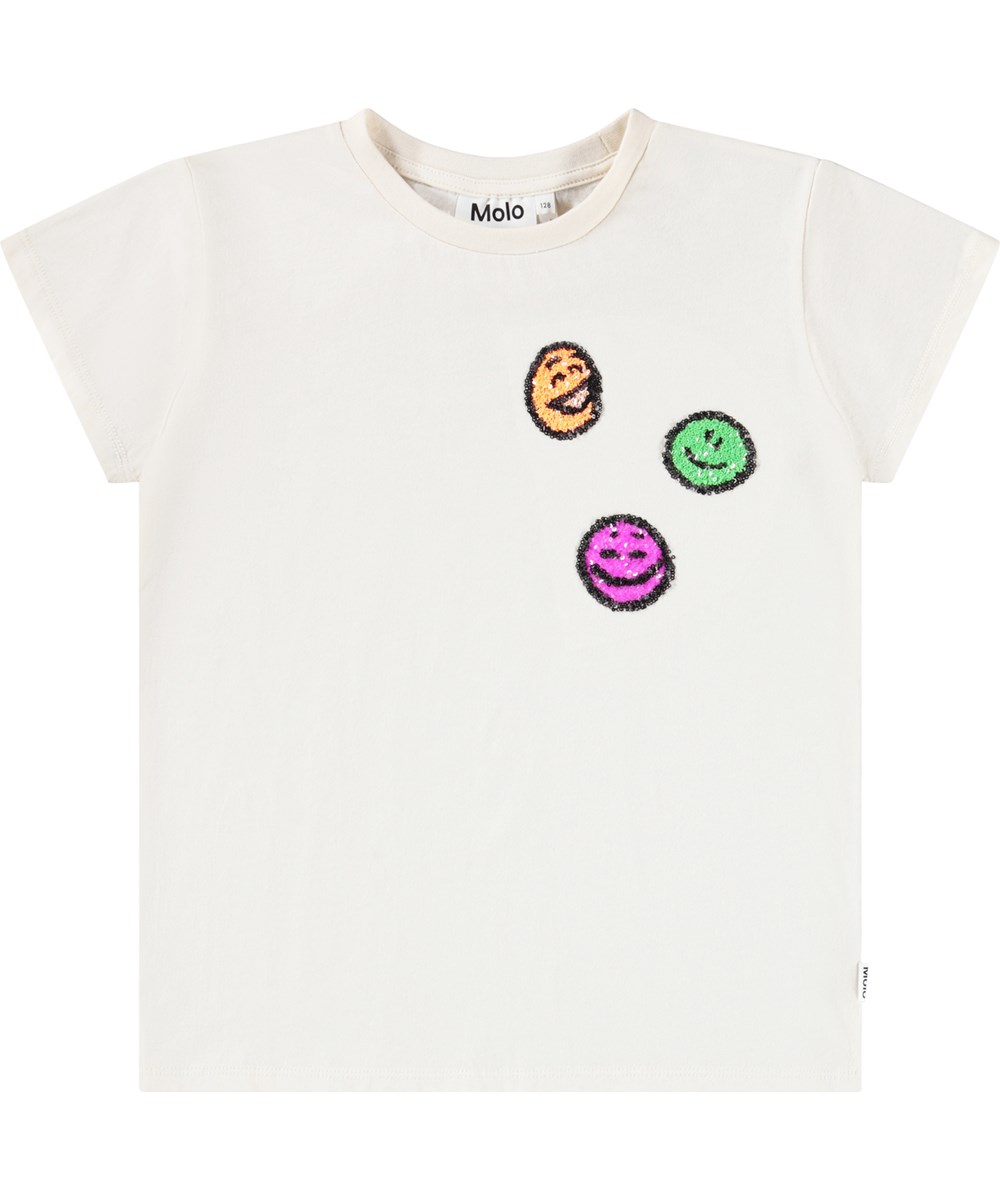 Ranva - Buttercream - Off-white short-sleeved T-shirt for children made of organic cotton with a round neck and smiling sequined faces.