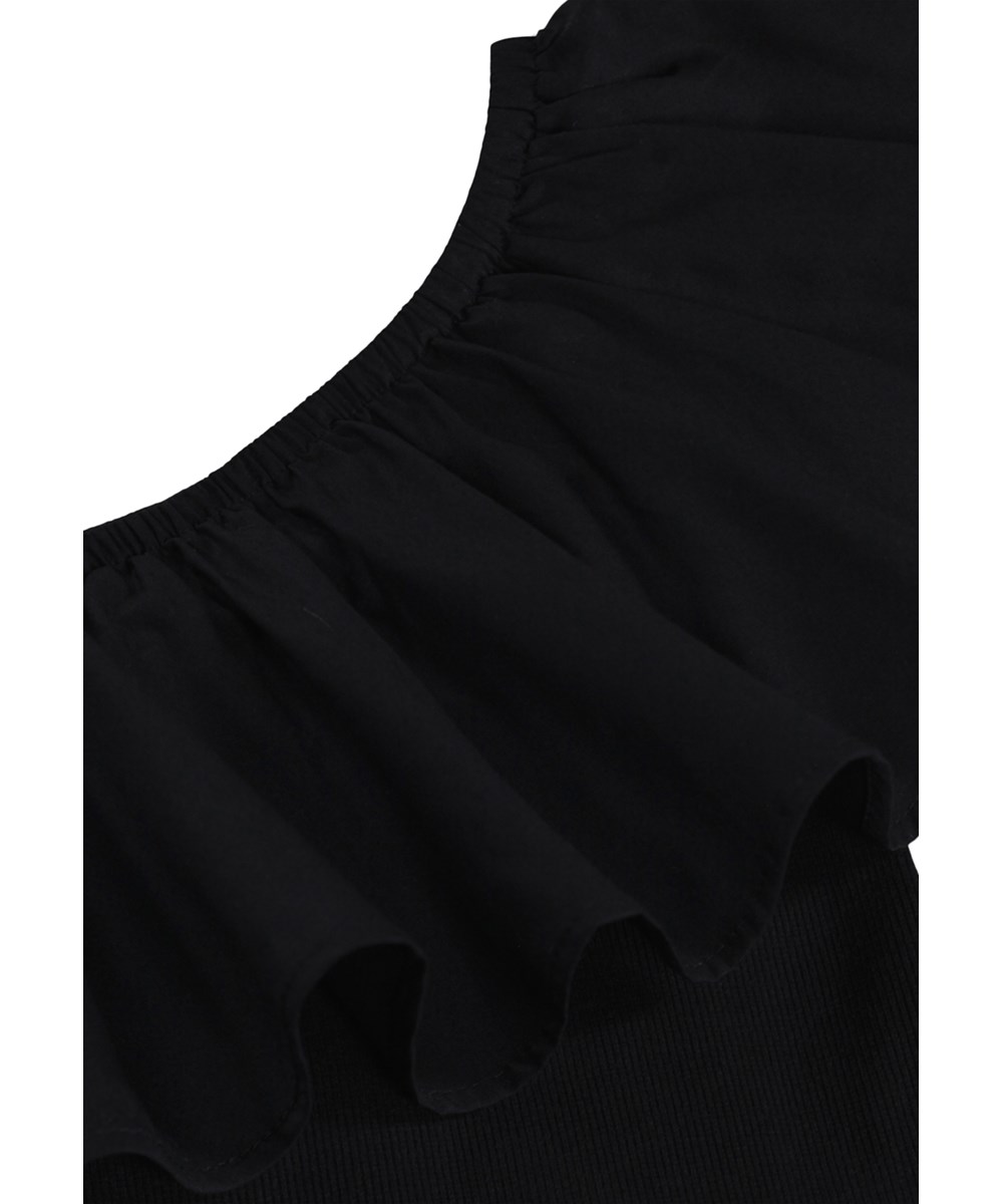 Rebecca - Black - Black one-shoulder top for children made of organic cotton 