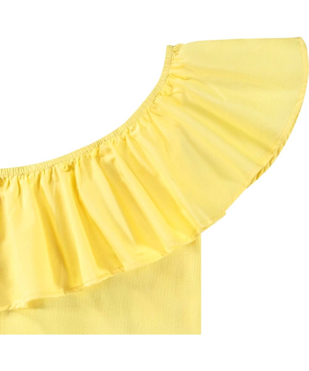 Rebecca - Sunbright - Yellow one-shoulder top for children in organic cotton with stretch.