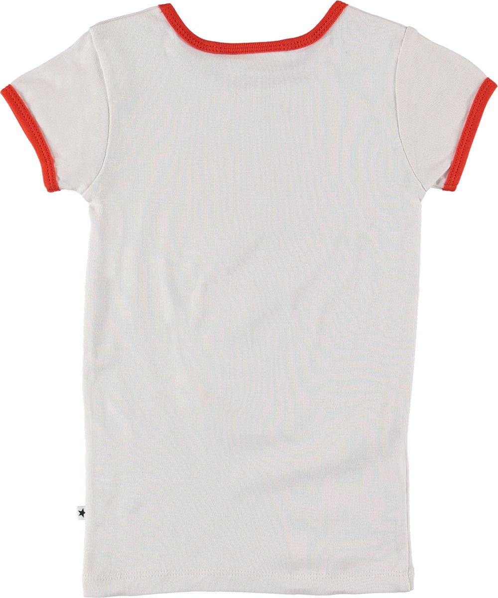 Rhiannon - Parchment - White t-shirt with red heart.  