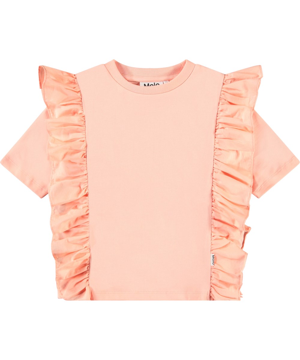 Riva - Peach - Light orange t-shirt for children in soft organic cotton with ribbed neckline and ruffle edge.