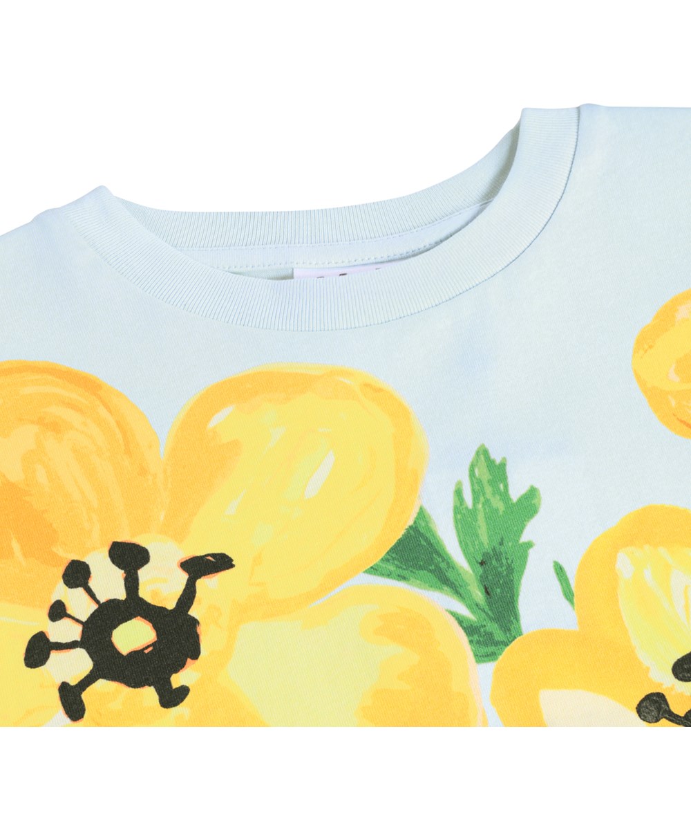 Rodney - Yellow Flora - Light blue T-shirt  for children made of organic cotton