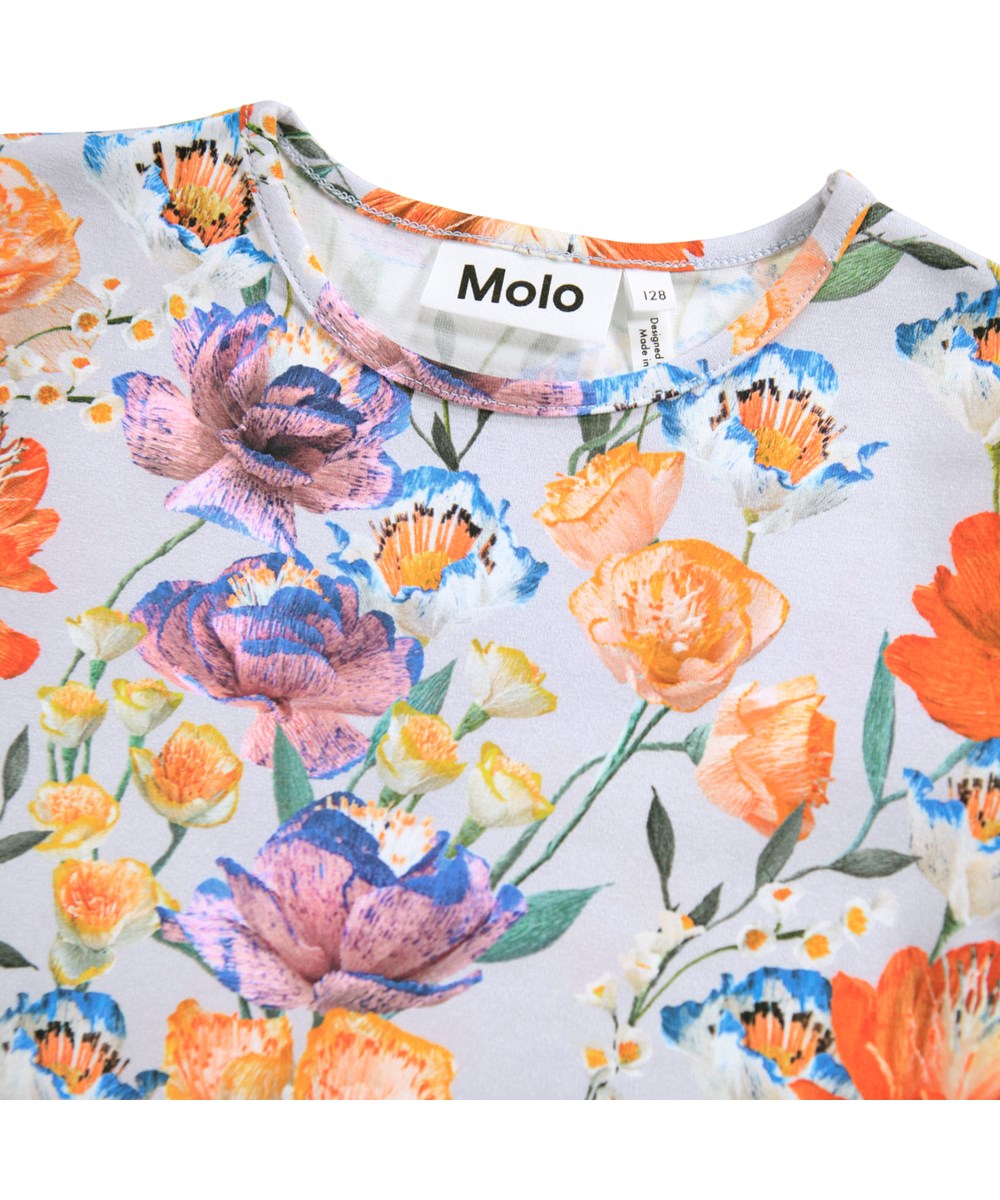 Rose - Paper Flowers - Light blue long-sleeved blouse for children made oforganic cotton with a round neck and edge band.