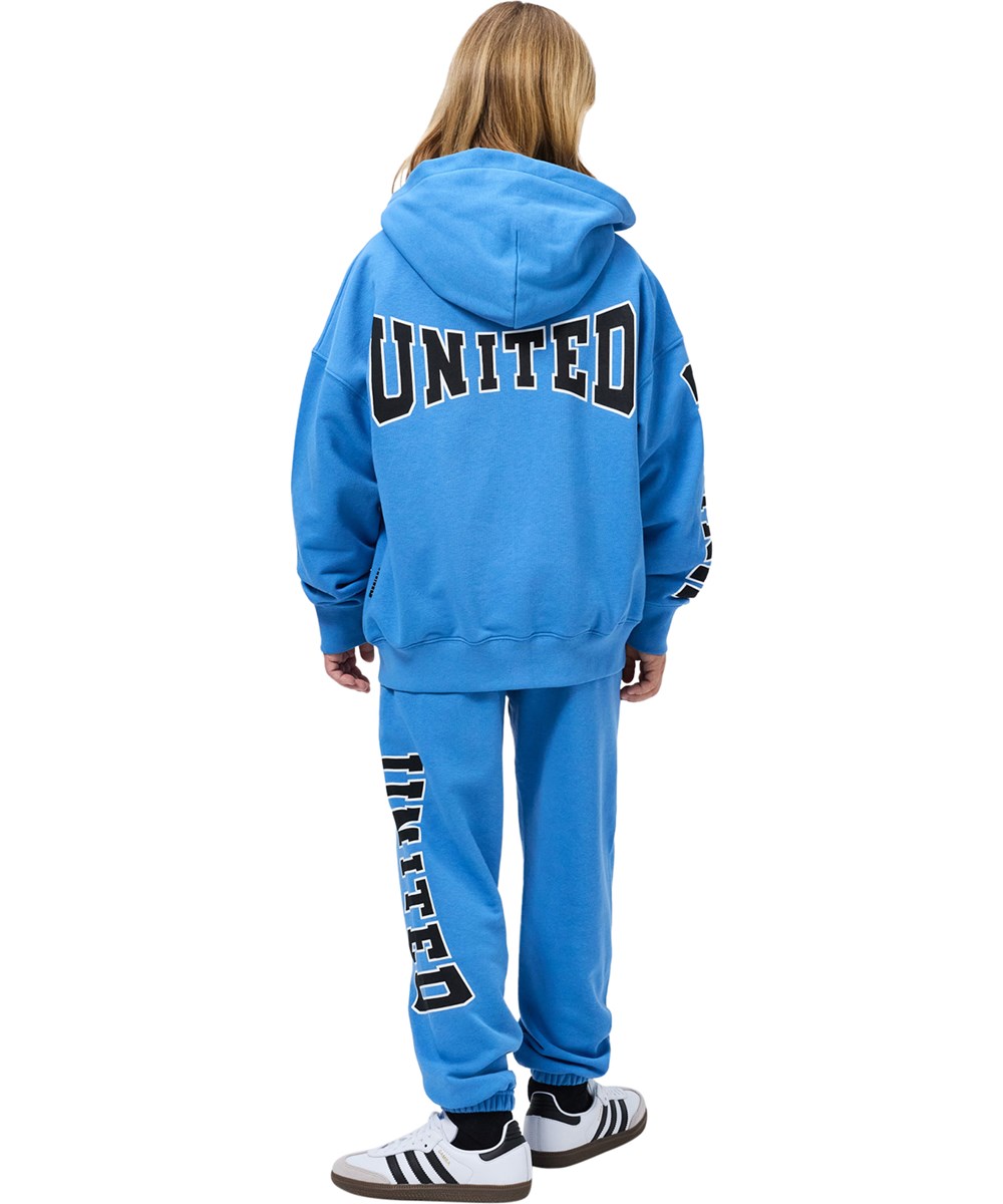 Allen - Blue Tide - Blauwe kinderjoggingbroek met een print gemaakt van zachte katoen