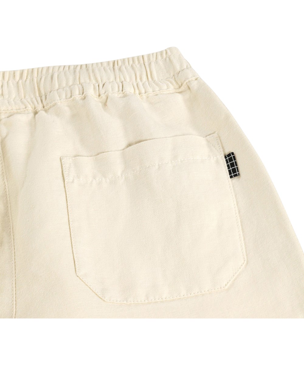 Amor - Summer Sand - Beige linnen kinderbroek met een elastische tailleband