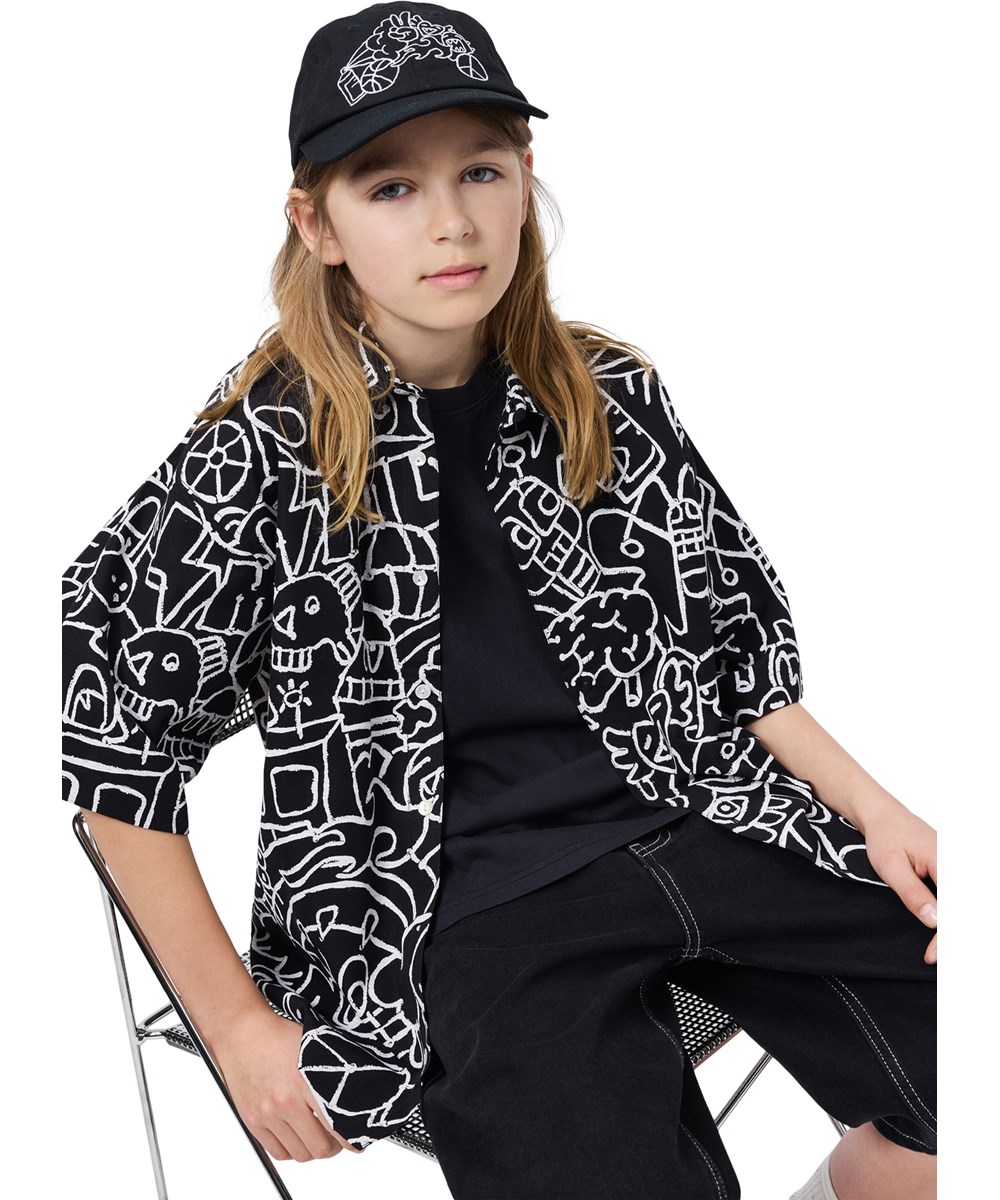 Richie - Net Doodle Dark - Zwart oversized kinderblouse gemaakt van biologisch katoen