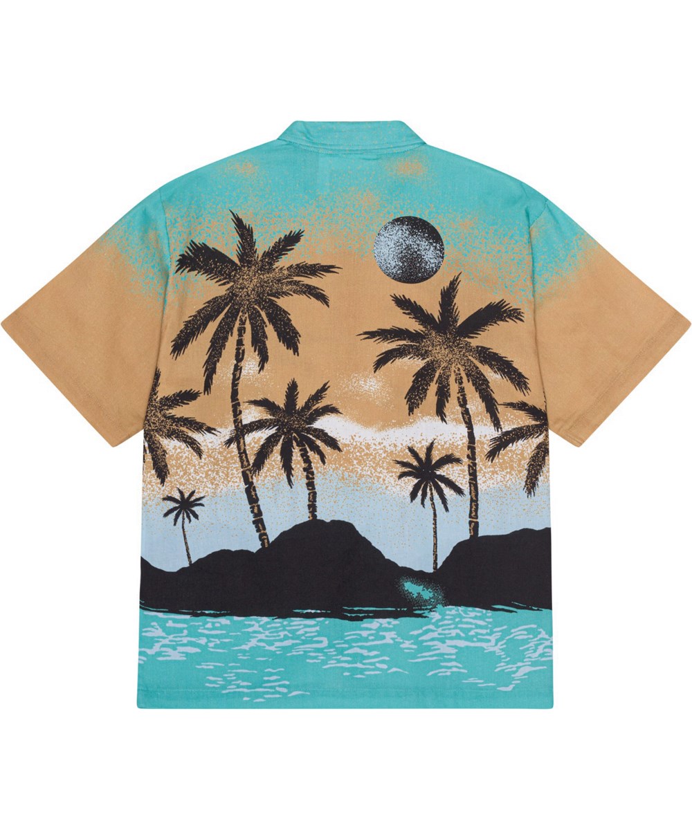 Rui - Holiday Island - Turquoise en zandkleurige biologische blouse met Hawai print