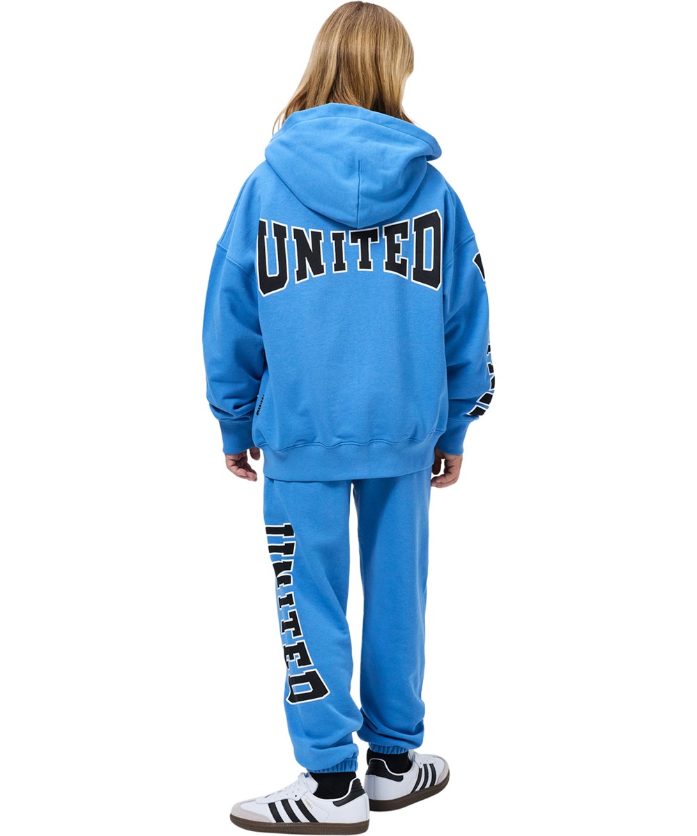 Marley - Blue Tide - Blauwe kinderhoodie met een print gemaakt van biologisch katoen