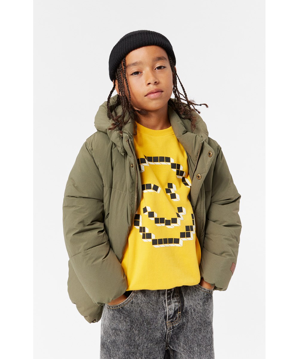 Memphis - Brilliance - Biologisch katoenen sweater met een print van een lachend pixelsmiley.