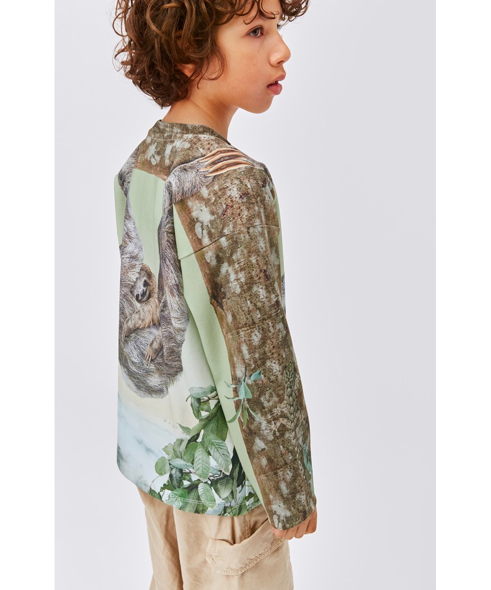 Milou - Sloth Life - Groene sweater met luiaard print