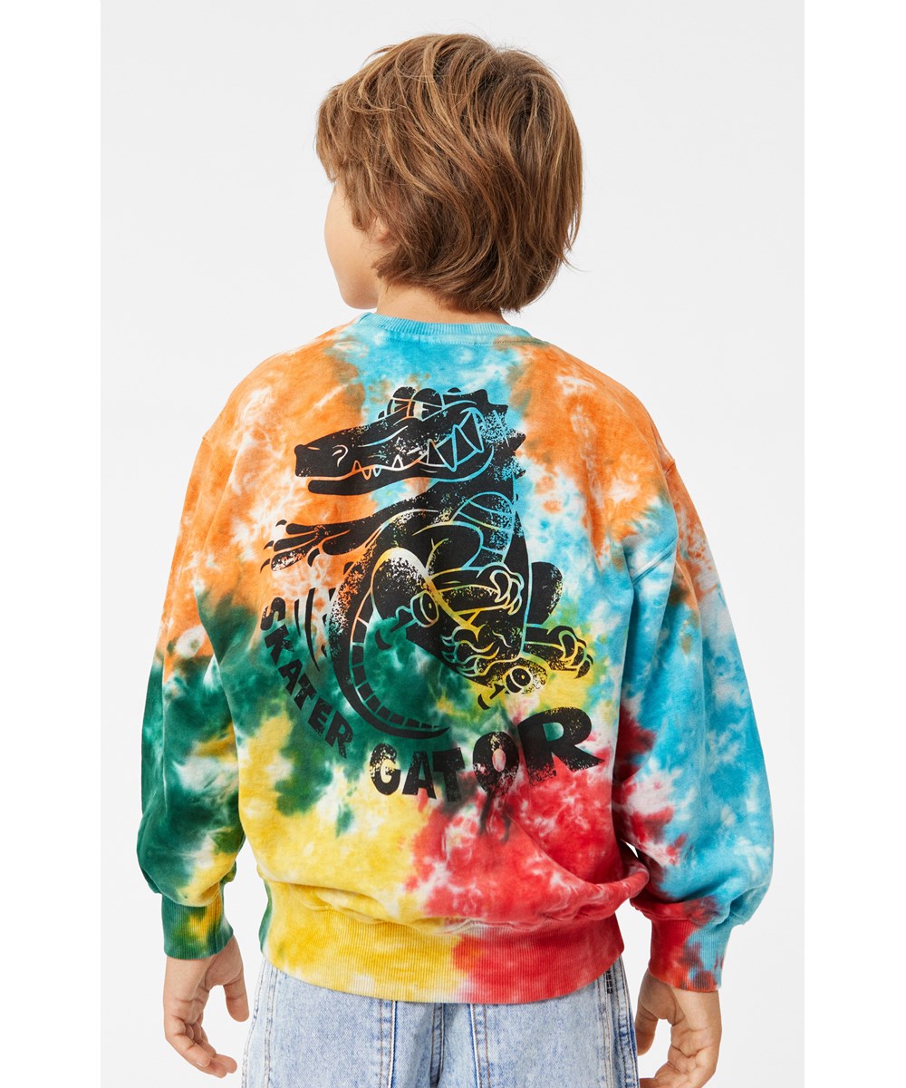 Monti - Colour Play - Kleurrijke tie-dye biologisch katoenen sweater met skater alligator print.