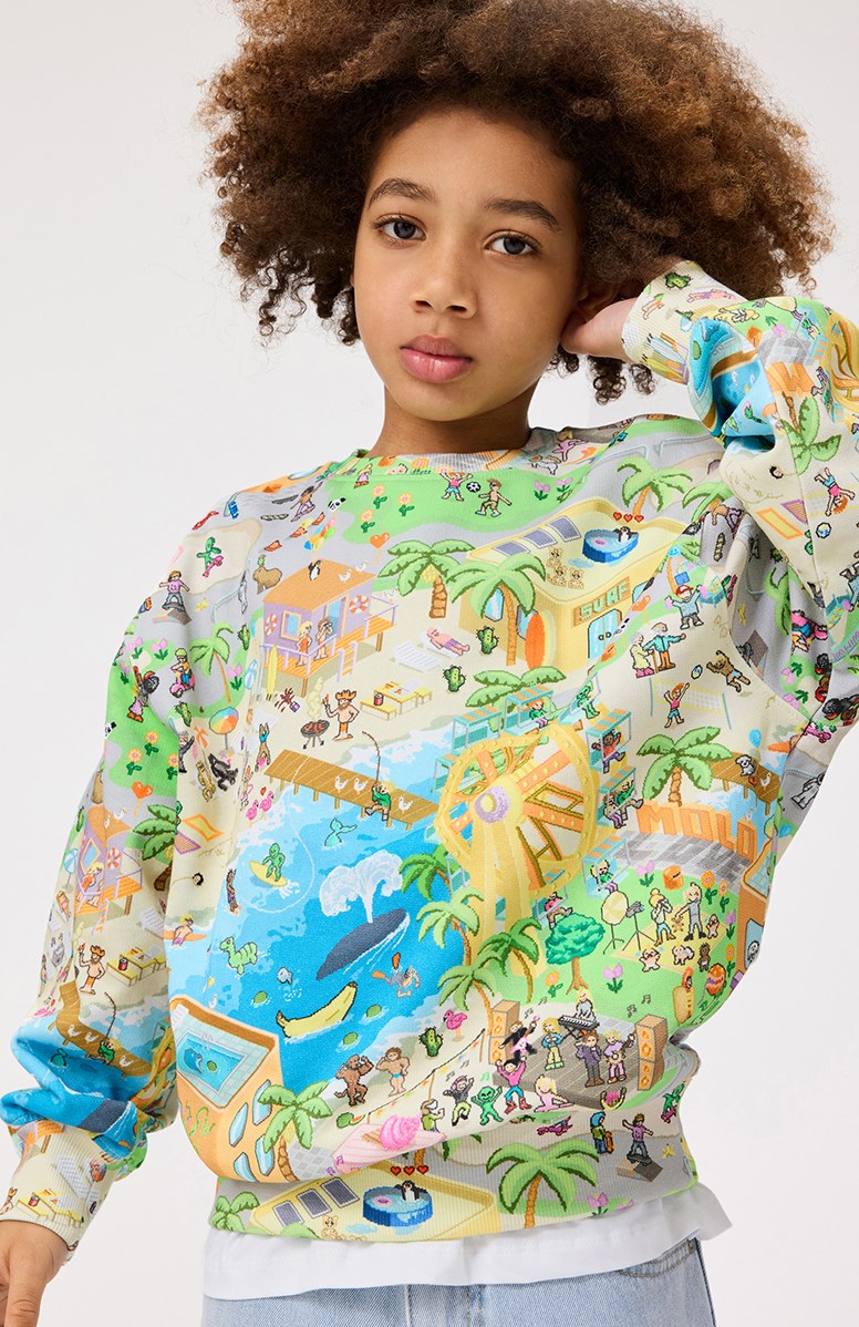 Monti - Pixelcation - Kleurrijke kindersweater van zacht biologisch katoen met print en ribboord rond de hals, mouwen en onderkant.