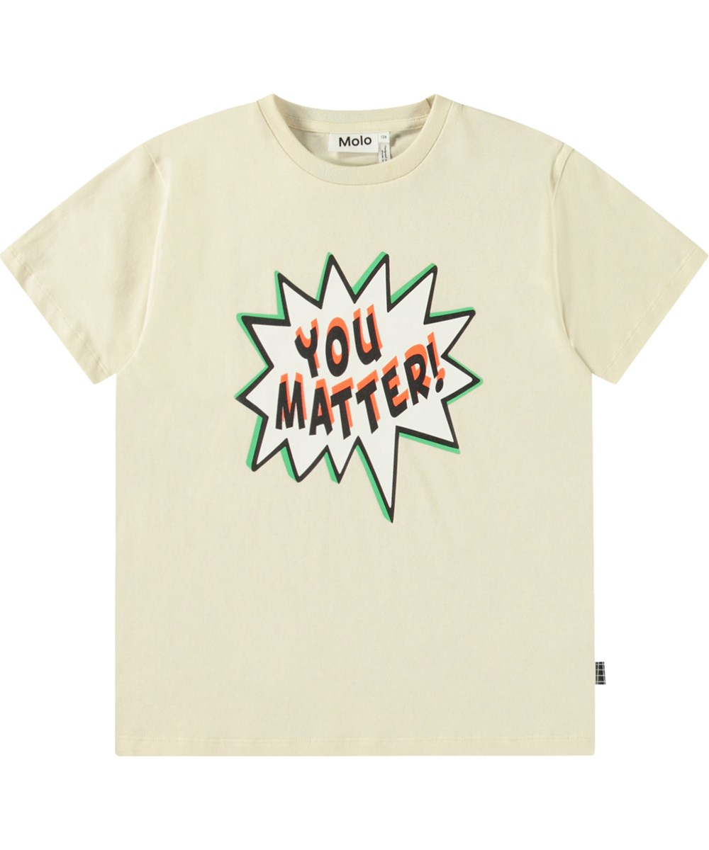 Riley - You Matter - Beige kinder t-shirt met print  in zacht biologisch katoen met korte mouwen en ribboord rond de hals.