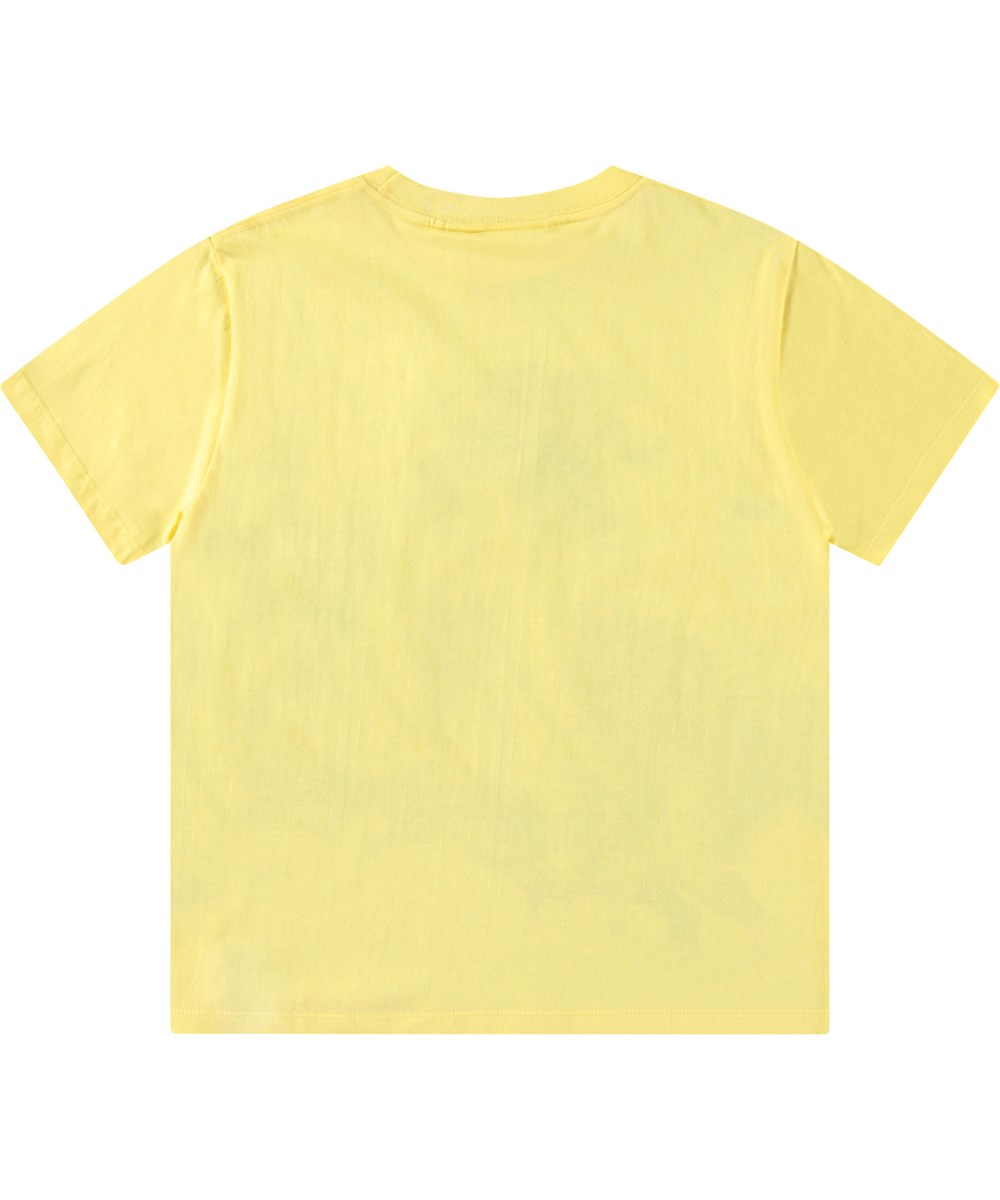 Roxo - Sunny Dinos - Ruimvallende geel kinder t-shirt van biologisch katoen met korte mouwen en ribboord rond de hals.