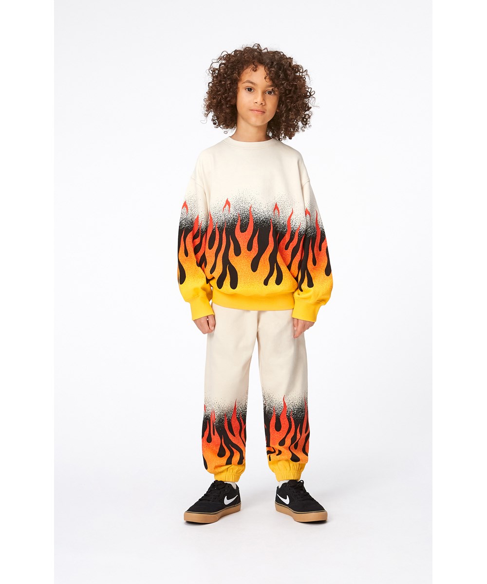 Adan - On Fire - Beige Öko-Jogginghose mit Flammendruck