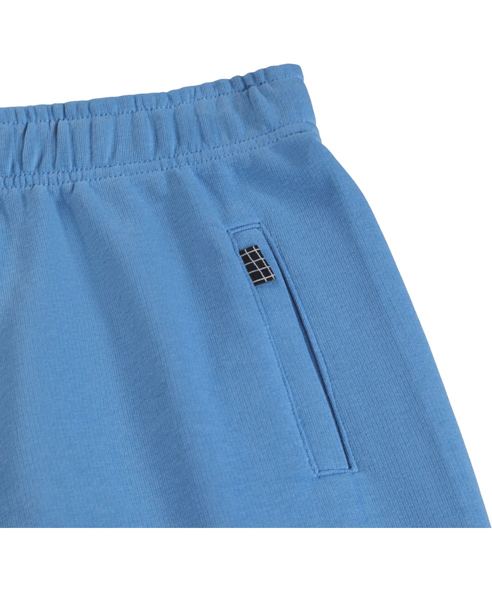 Allen - Blue Tide - Blaue Jogginghosen für Kinder aus weicher Baumwolle mit Aufdruck