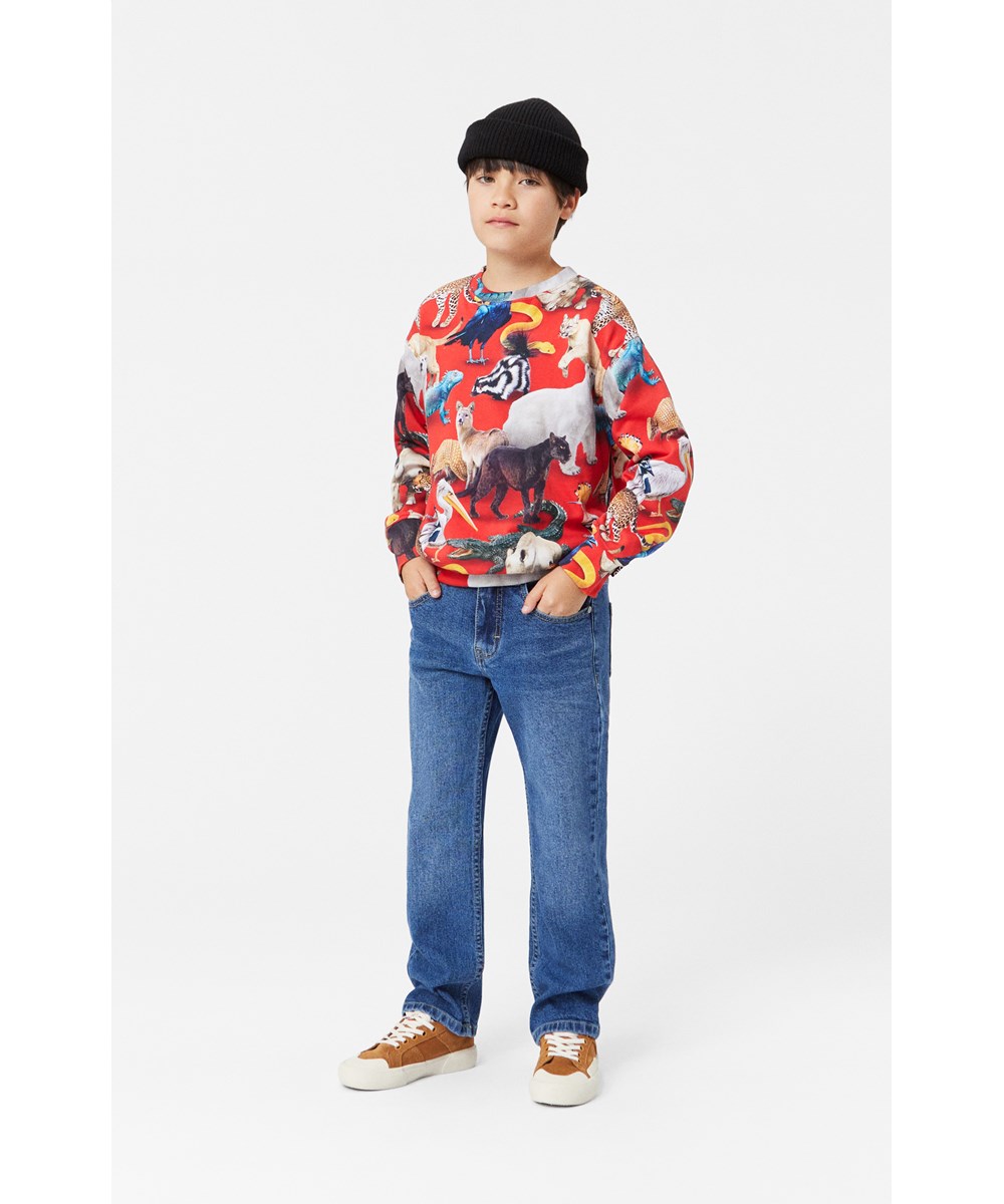 Andy - Dark Vintage - Blaue Stretch-Jeans mit kupferfarbenen Nähten und verstellbarem Bund.