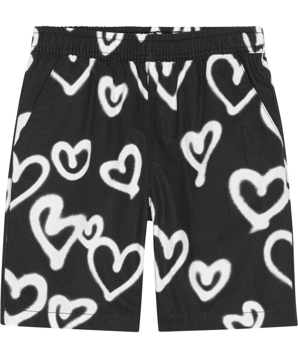 Avart - Sprayed Hearts - Knielange schwarze Shorts aus Baumwolle mit Allover-Print aus weißen Graffiti-Herzen.
