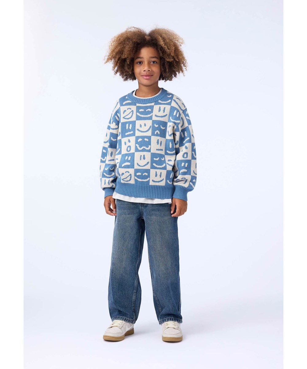 Bello - Moods Knit - Gestreifter Pullover aus einer Baumwoll-Wollmischung mit einem Muster aus lächelnden Gesichtern in Blau und Weiß.