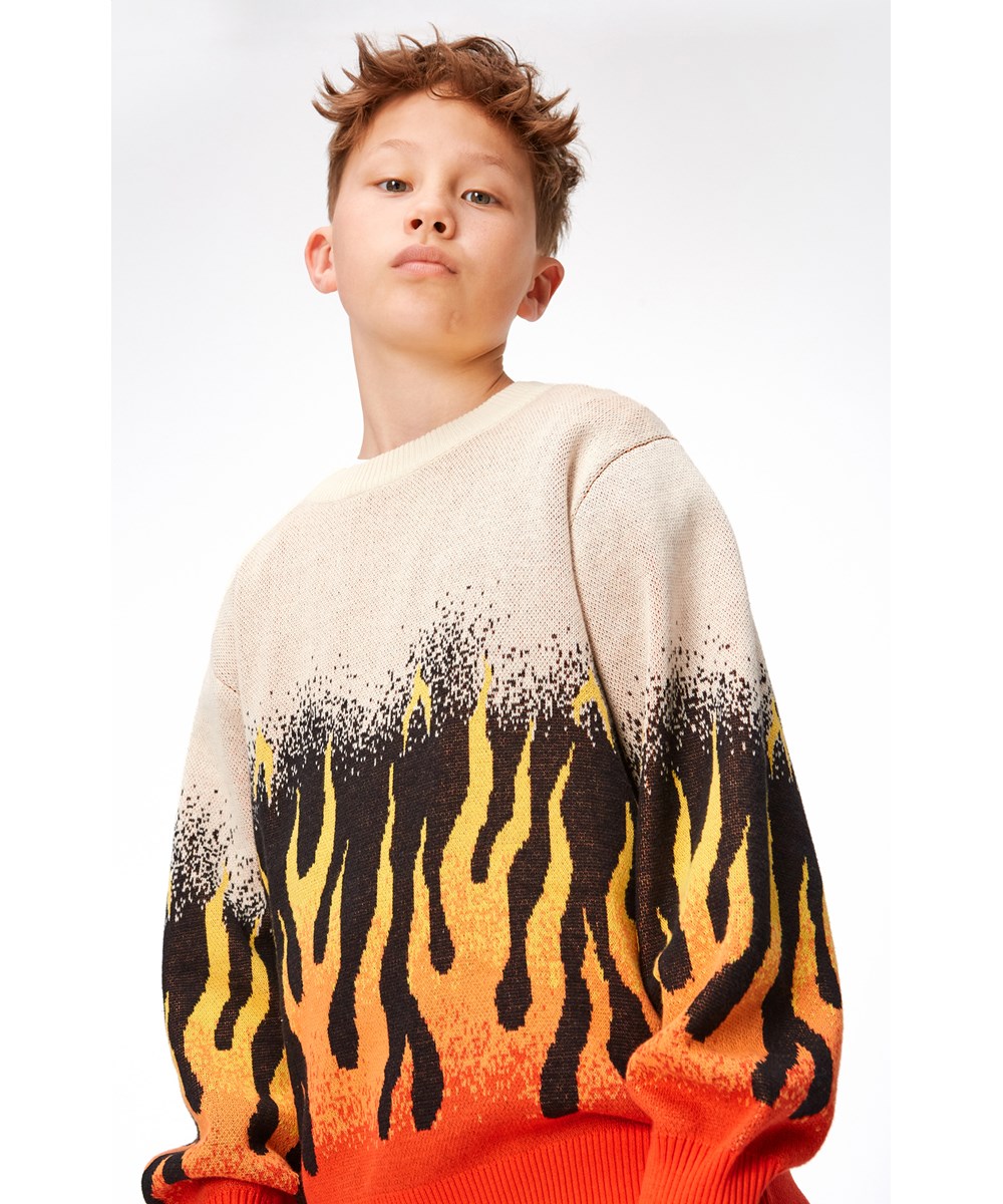 Bello - On Fire - Beigefarbener Öko-Strickpullover mit Flammenmotiv
