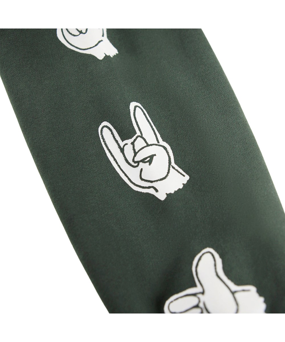 Marley - By Hands - Dunkelgrüner Hoodie mit Reißverschluss für Kinder aus Öko-Baumwolle mit einem weißen Handzeichen-Druck.