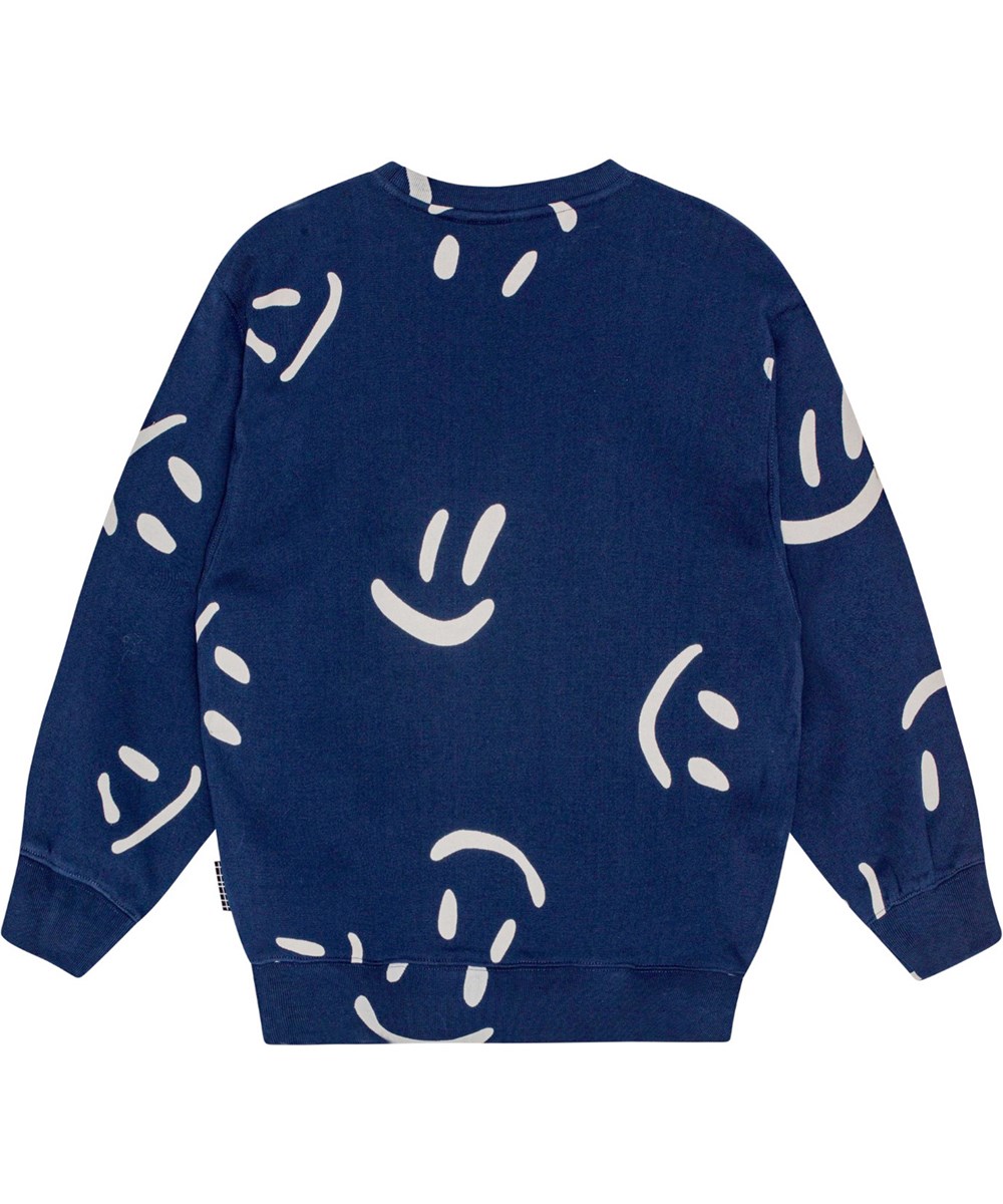 Monti - Big Smiles Navy - Dunkelblaues Öko-Baumwoll-Sweatshirt mit weißem Lächelndem-Druck.
