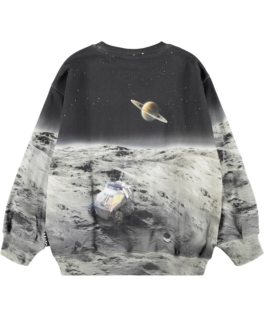 Monti - Moon Traveller - Sweatshirt aus weicher Öko-Baumwolle für Kinder mit einem Aufdruck eines Astronauten auf dem Mond.