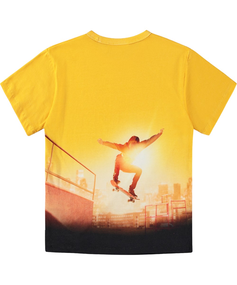 Riley - Sunny Skaters - Gelbes T-Shirt aus Öko-Baumwolle mit Skater-Print.