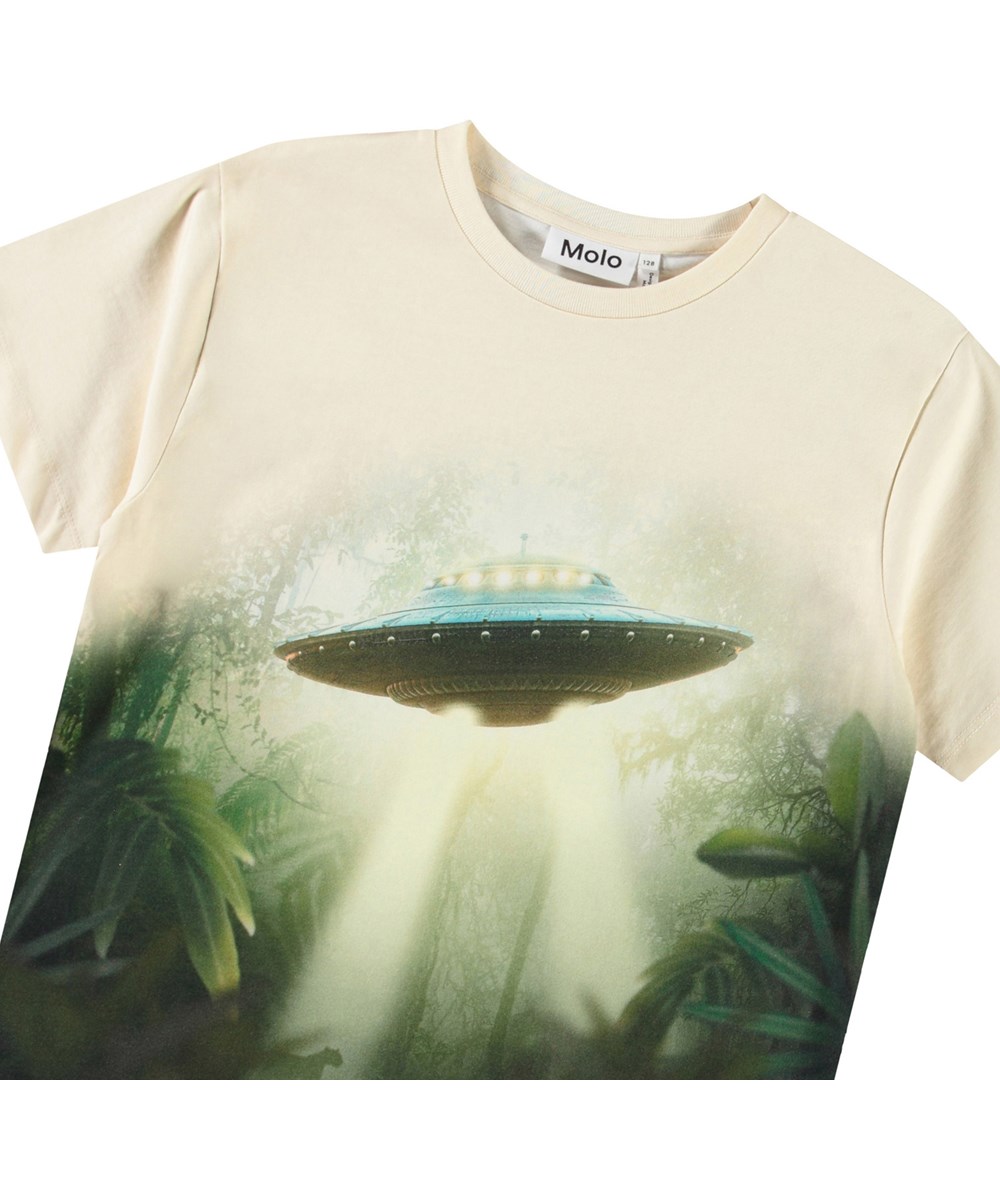 Riley - UFO Jungle - Off-weißes T-Shirt mit Druck für Kinder aus weicher Öko-Baumwolle mit kurzen Ärmeln und geripptem Ausschnitt.