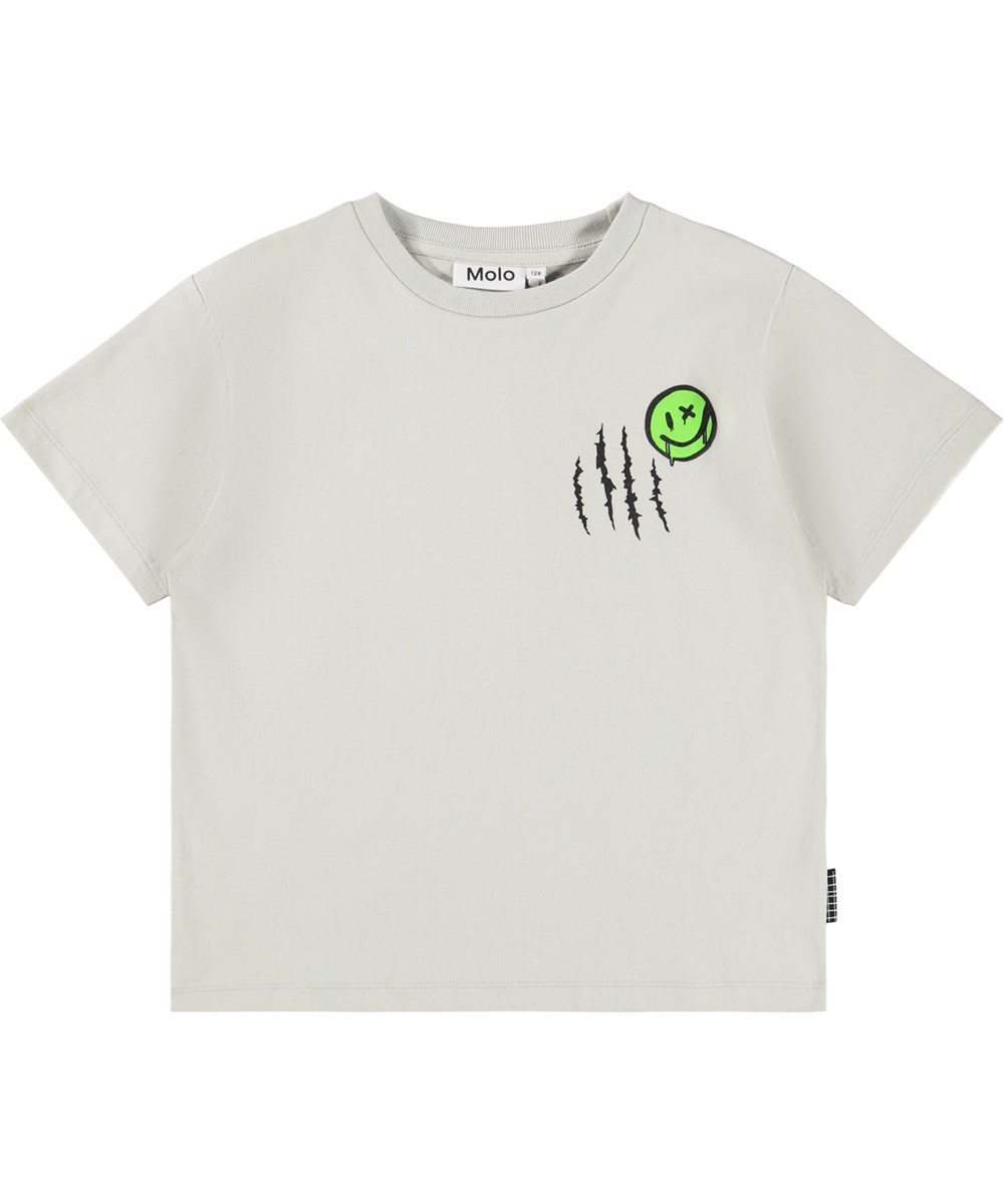 Riley - Scating - Beiges T-Shirt für Kinder aus weicher Öko-Baumwolle mit Druck, kurzen Ärmeln und geripptem Ausschnitt.