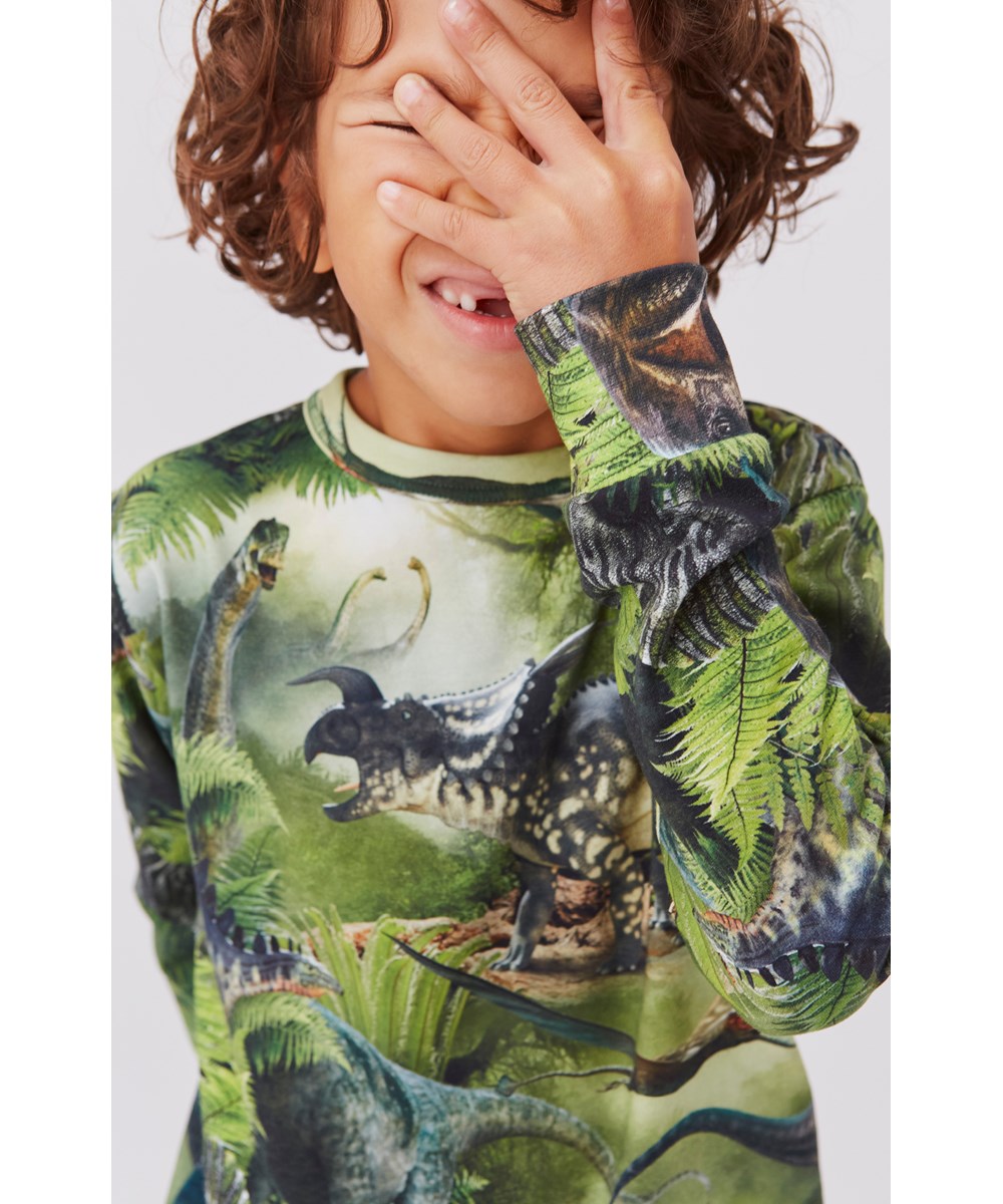 Rill - Dinos - Grünes Öko-Langarmshirt mit Dinosaurier-Print
