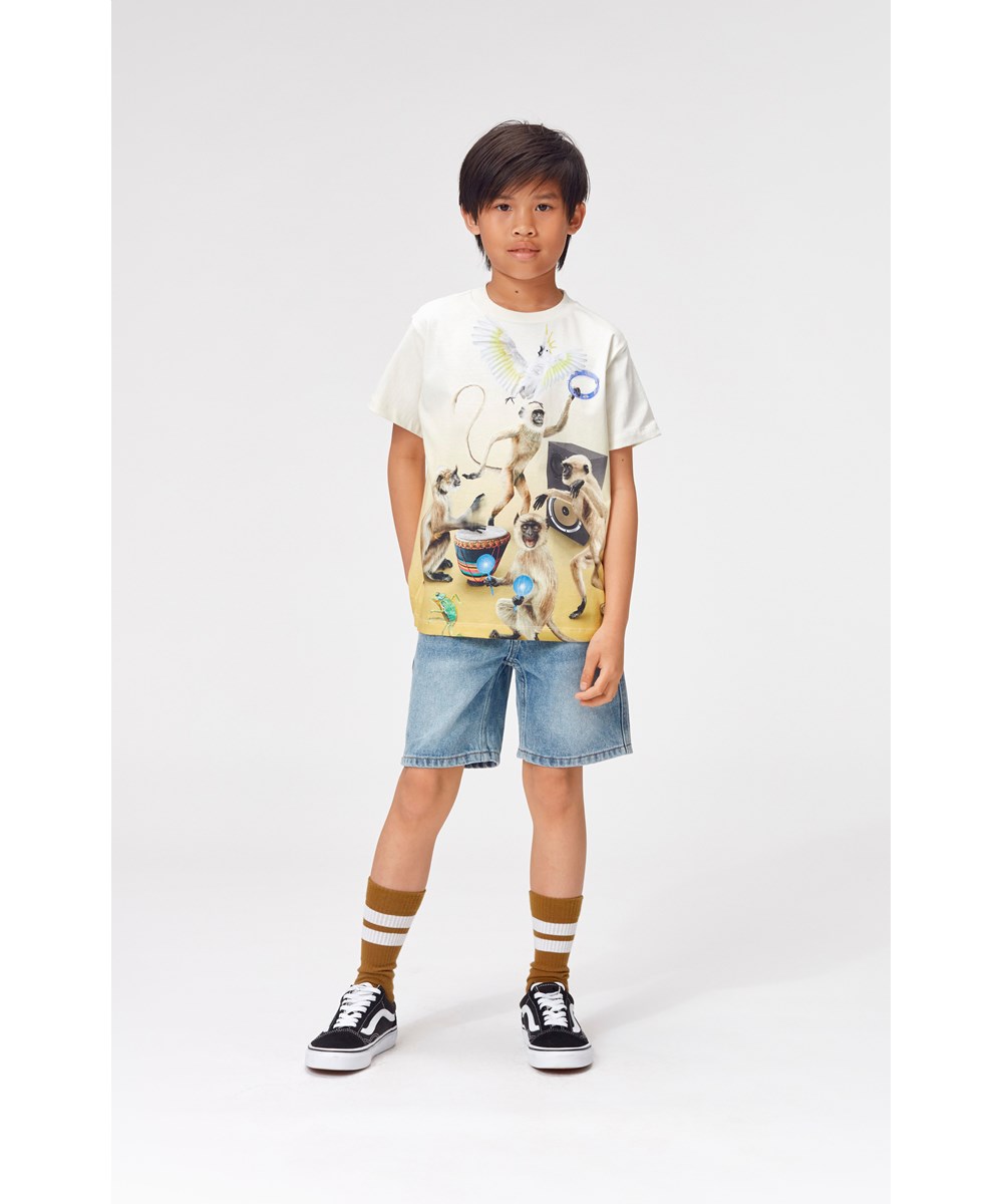 Roxo - Dancing Monkeys - T-Shirt mit tanzenden Affen und Instrumenten-Print.