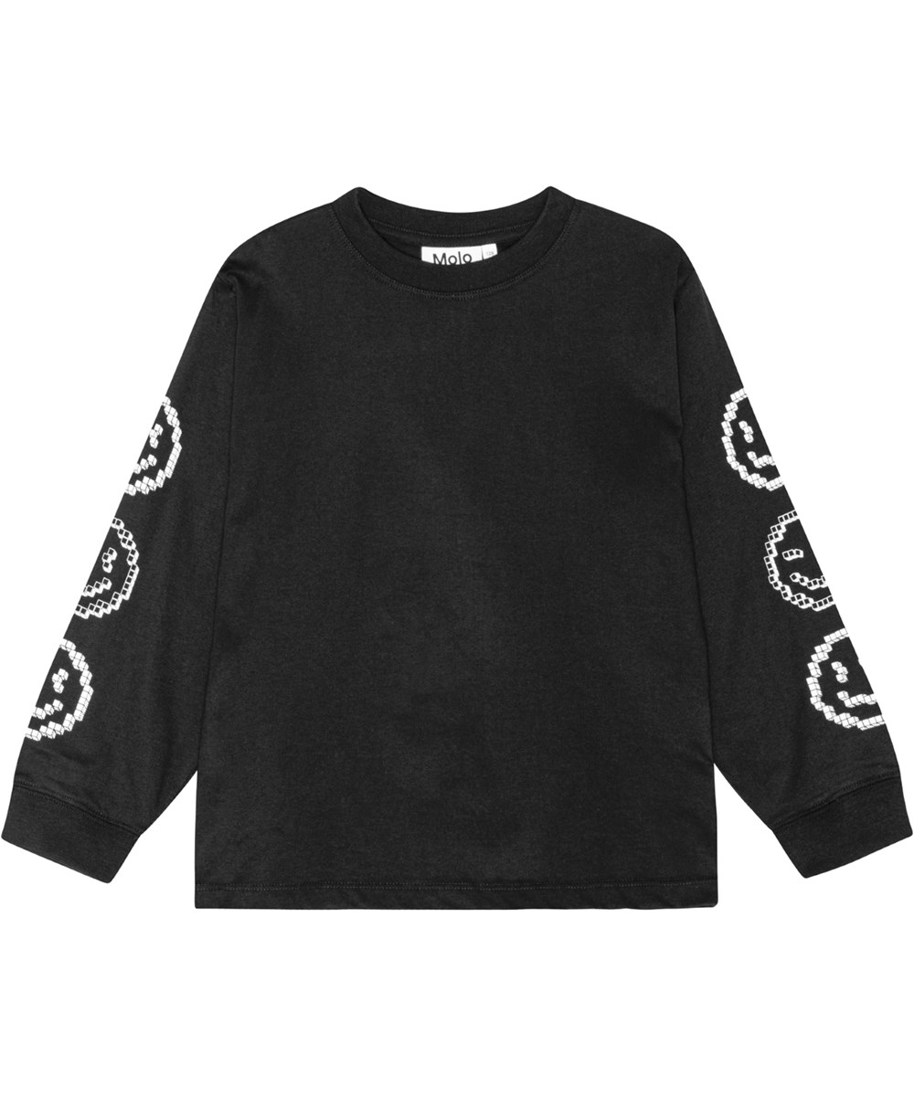 Rube - Smiling Pixels - Schwarze Bluse mit weißen pixeligen Gesichtern auf den Ärmeln bedruckt.