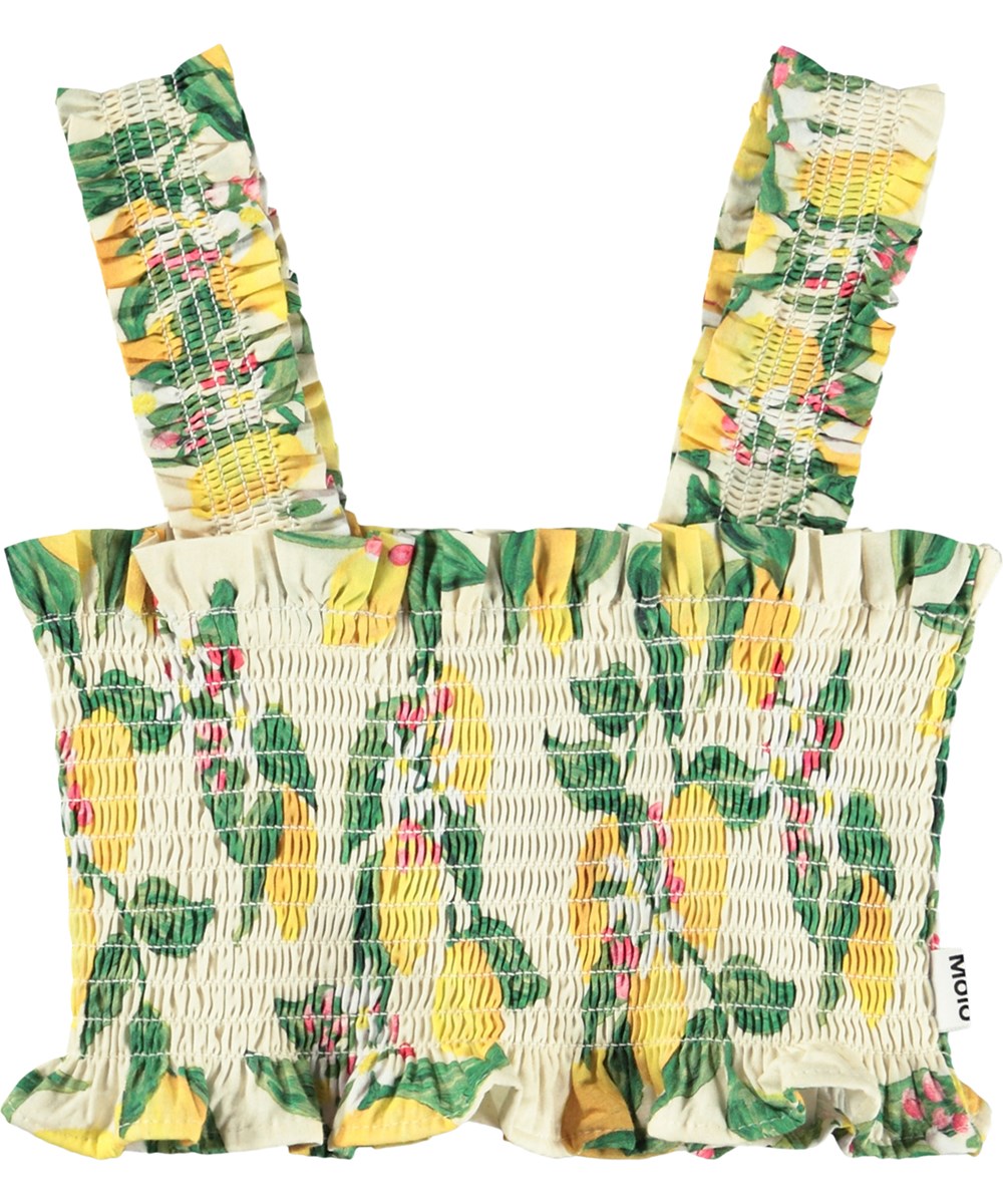 Rolfia - Citrus - Gelbes Crop-Top für Kinder mit Smok-Effekt und Print.