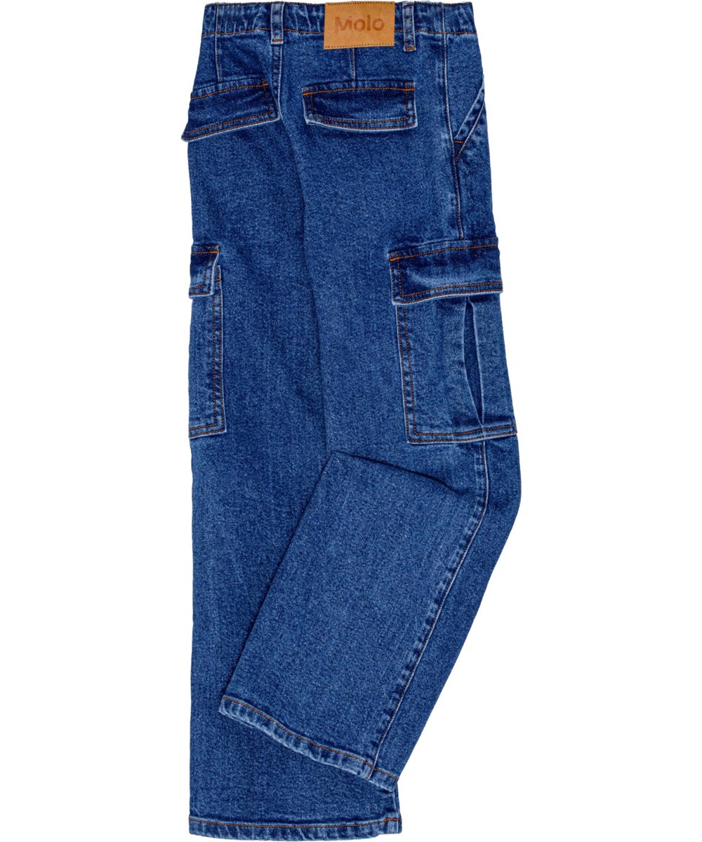 Addy - Washed Vintage - Aus Öko-Baumwolle gefertigte Schlaghose in Denim-Blau mit Taschen.