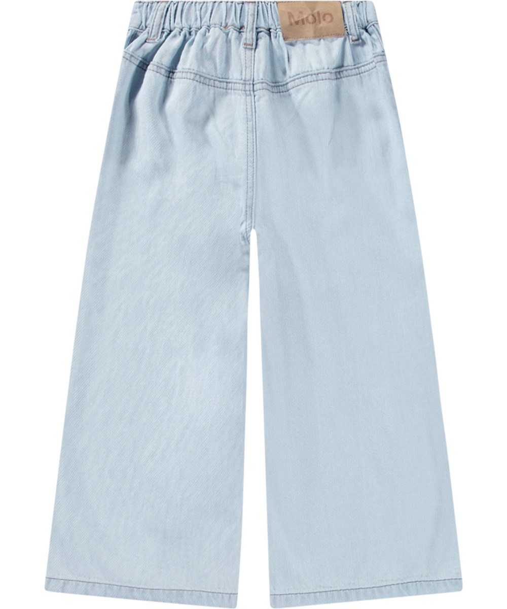Adionella - Bleached Drapy - Hellblaue verkürzte Hose aus Viskose mit gesteppten Falten und Denim-Look für Kinder.