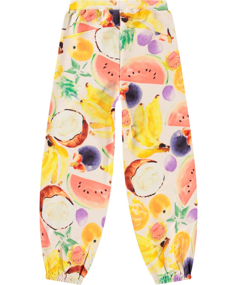 Adriana - Fruit Salad - Jerseyhose aus Öko-Baumwolle mit einem Druck bunter Früchte.