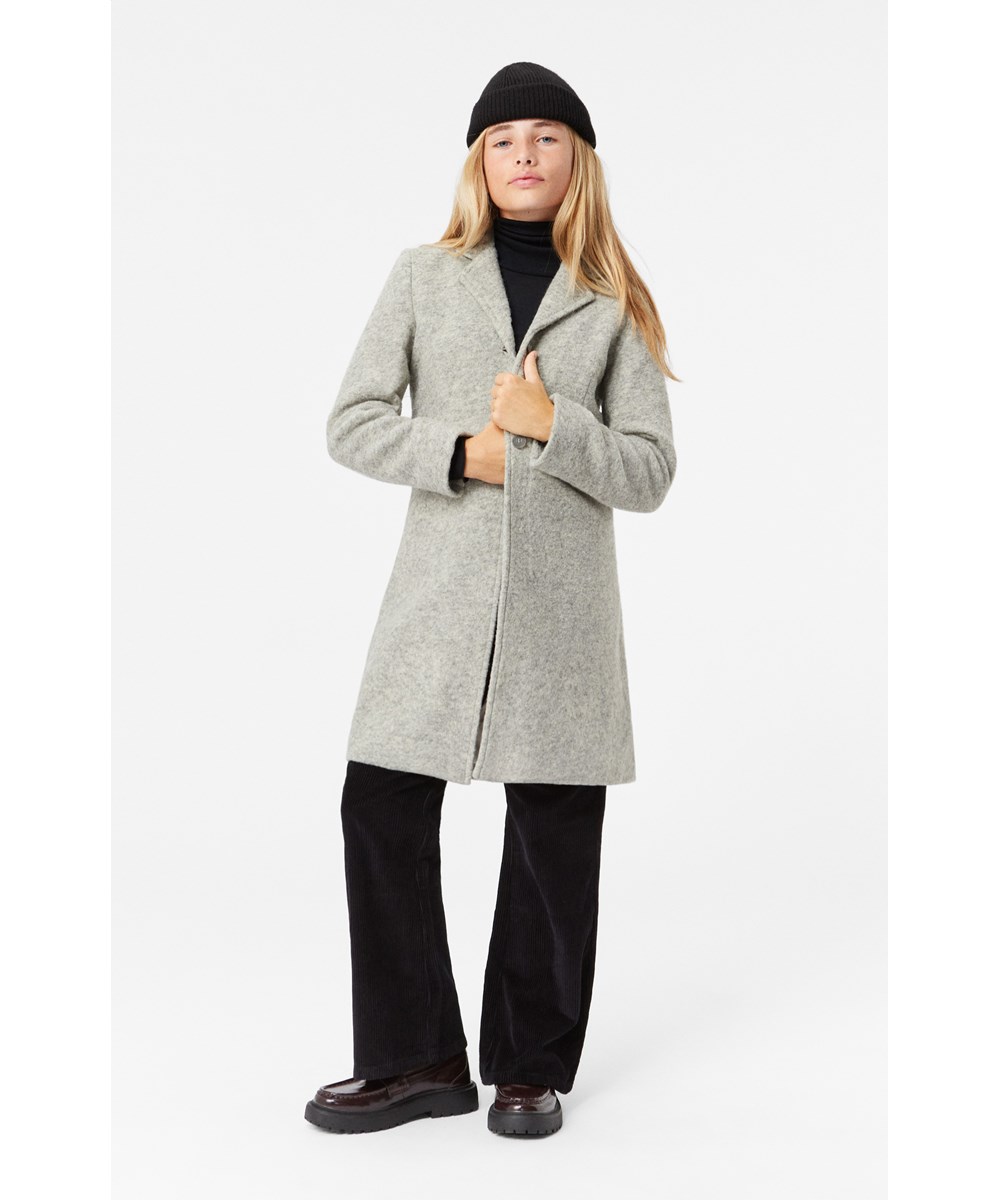 Aida - Black - Ausgestellte schwarze Samthose mit Vorder- und Gesäßtaschen.