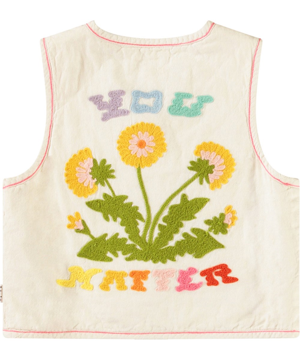 Heather - Fancy Dandelion - Sandfarbene, gefütterte Weste mit Stickerei für Kinder aus weicher Baumwolle mit einem runden Ausschnitt, Knopfverschluss vorne und rosa Nähten.