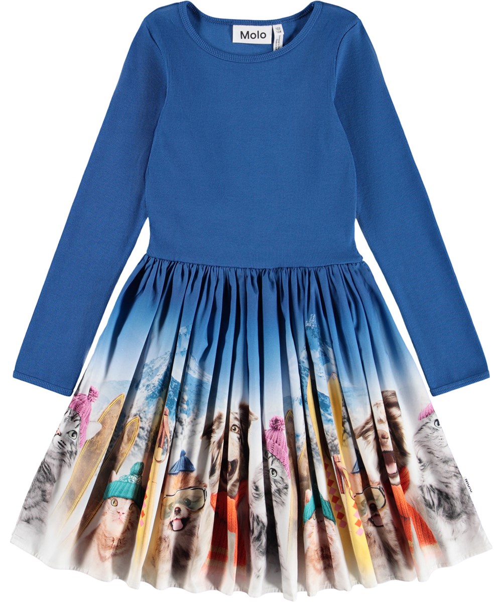 Casie Warm - Ski Trip - Langärmeliges blaues Kleid für Kinder aus Öko-Baumwolle mit einem Rock aus gebürsteter Baumwollflanell.