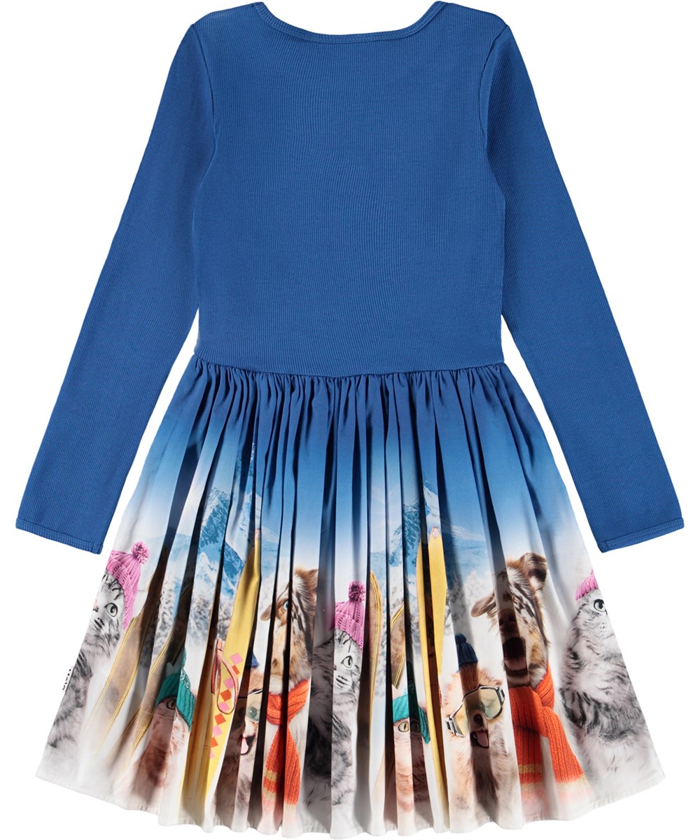 Casie Warm - Ski Trip - Langärmeliges blaues Kleid für Kinder aus Öko-Baumwolle mit einem Rock aus gebürsteter Baumwollflanell.